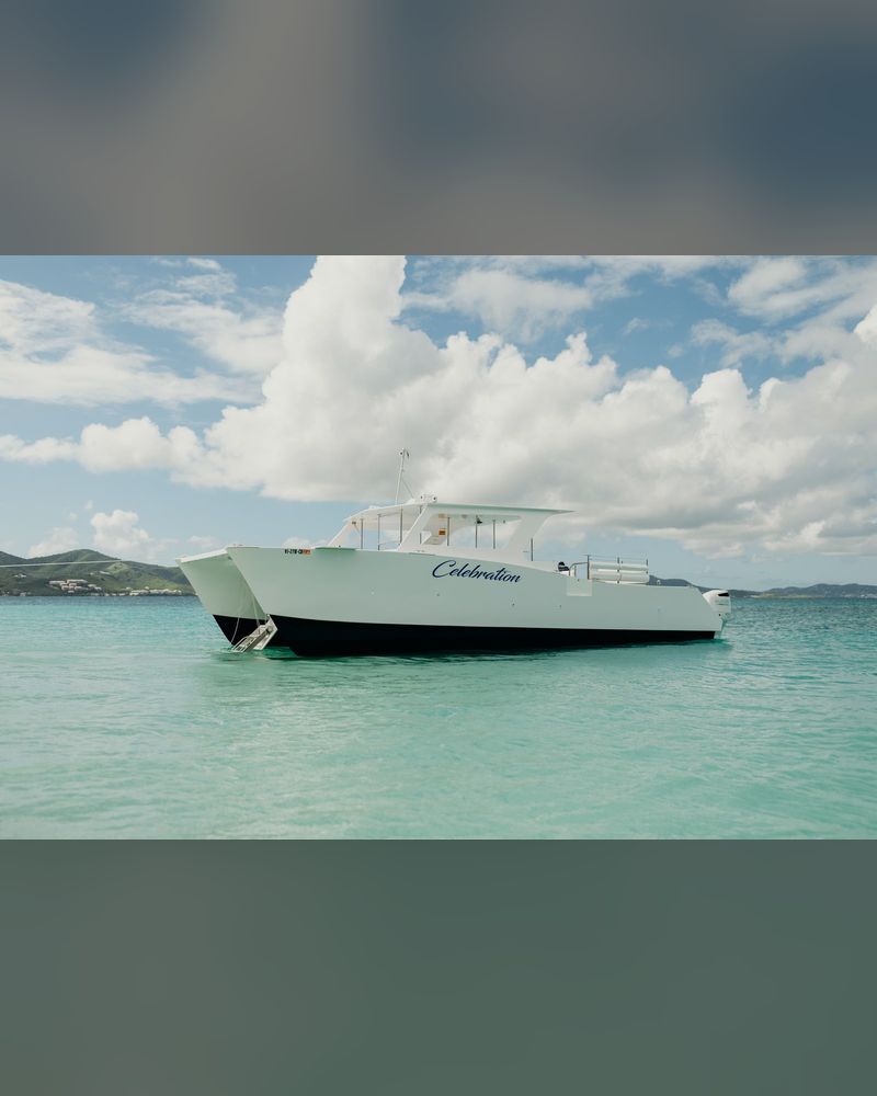 Celebration power catamaran anchored off Buck Island on the half day Buck Island snorkel tour from St. Croix